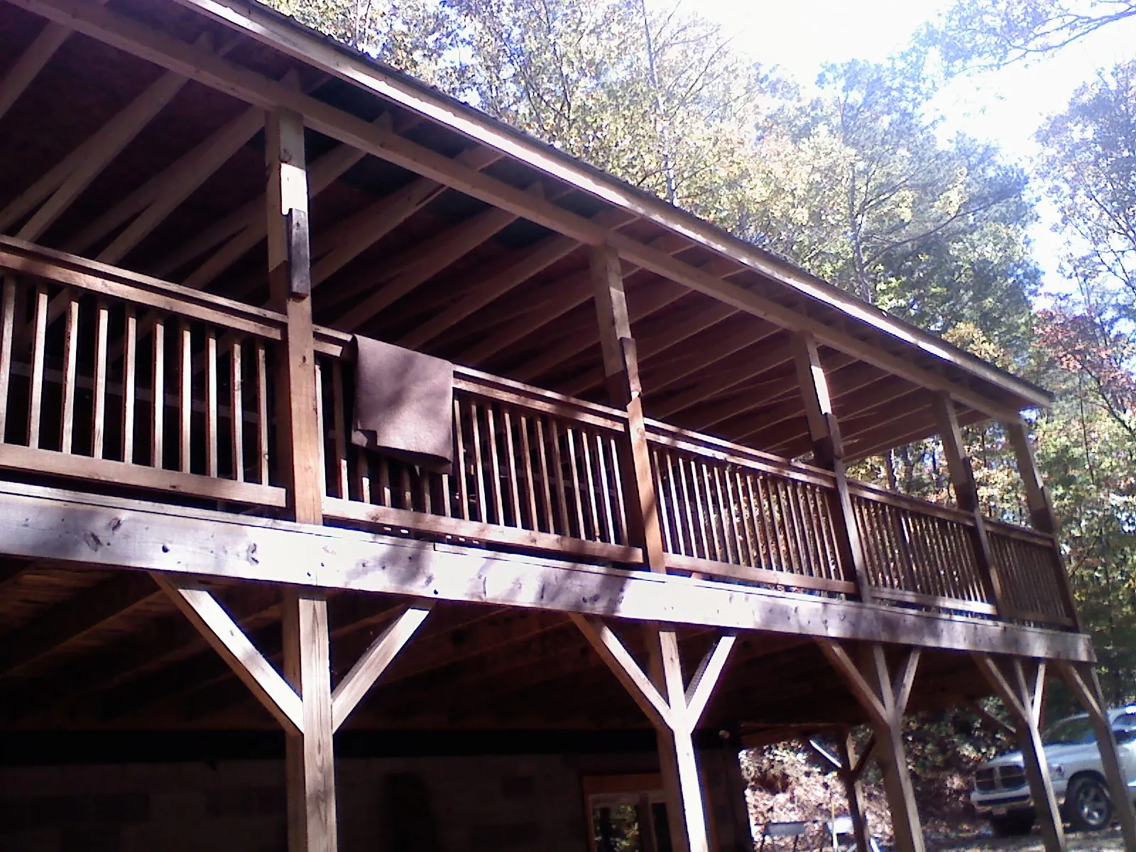 Timber framing under a new elevated porch and deck — Roof Leak Repair in Garrett Park by Roofing Brothers